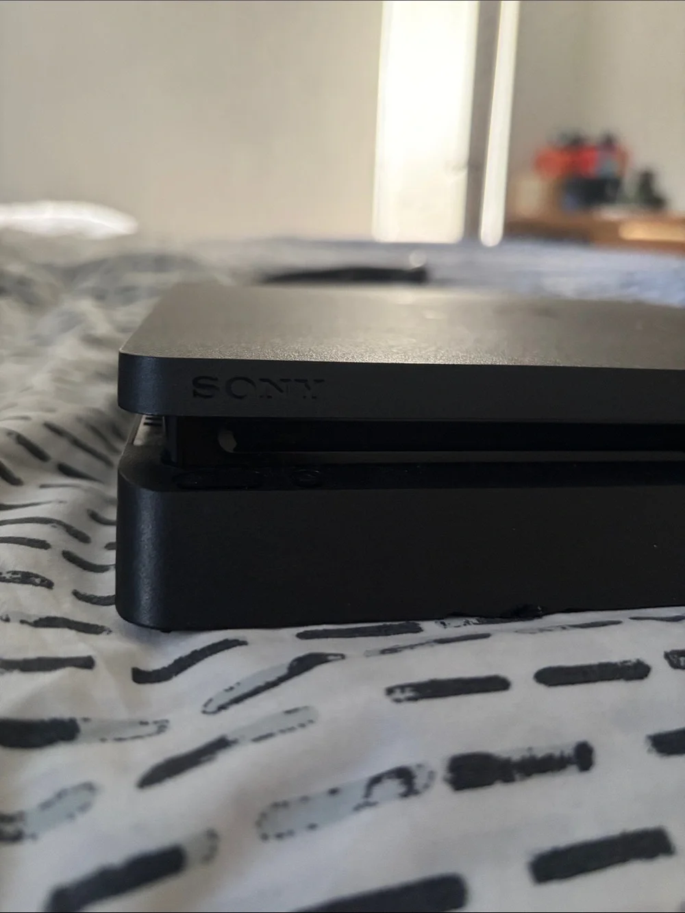 Sony Black PlayStation Slim Console with Cables